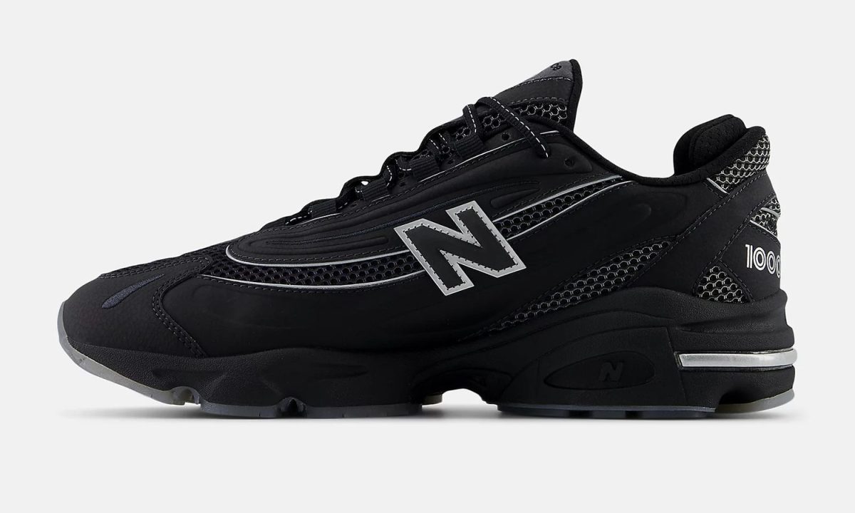 side view black new balance sneakers