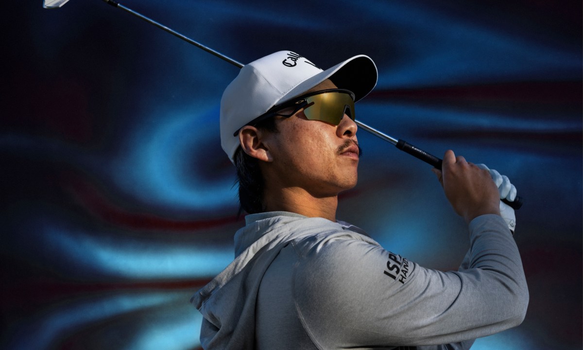 Golf Star Min Woo Lee as he takes a swing