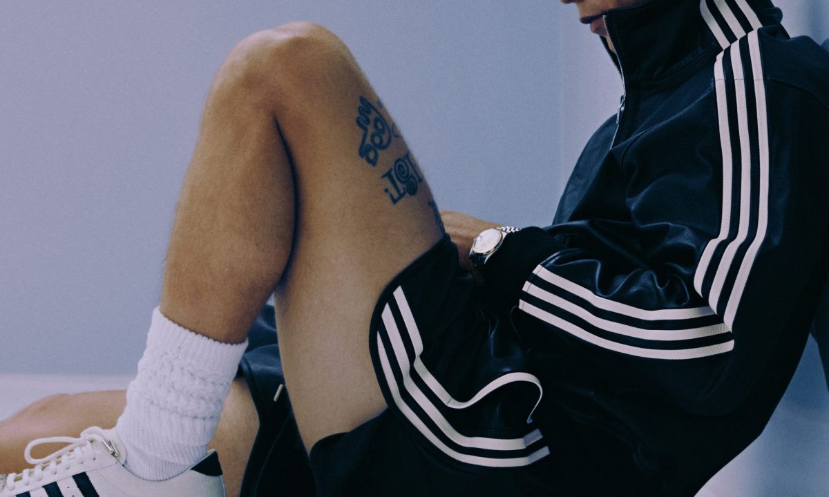 Hank wearing adidas superstar