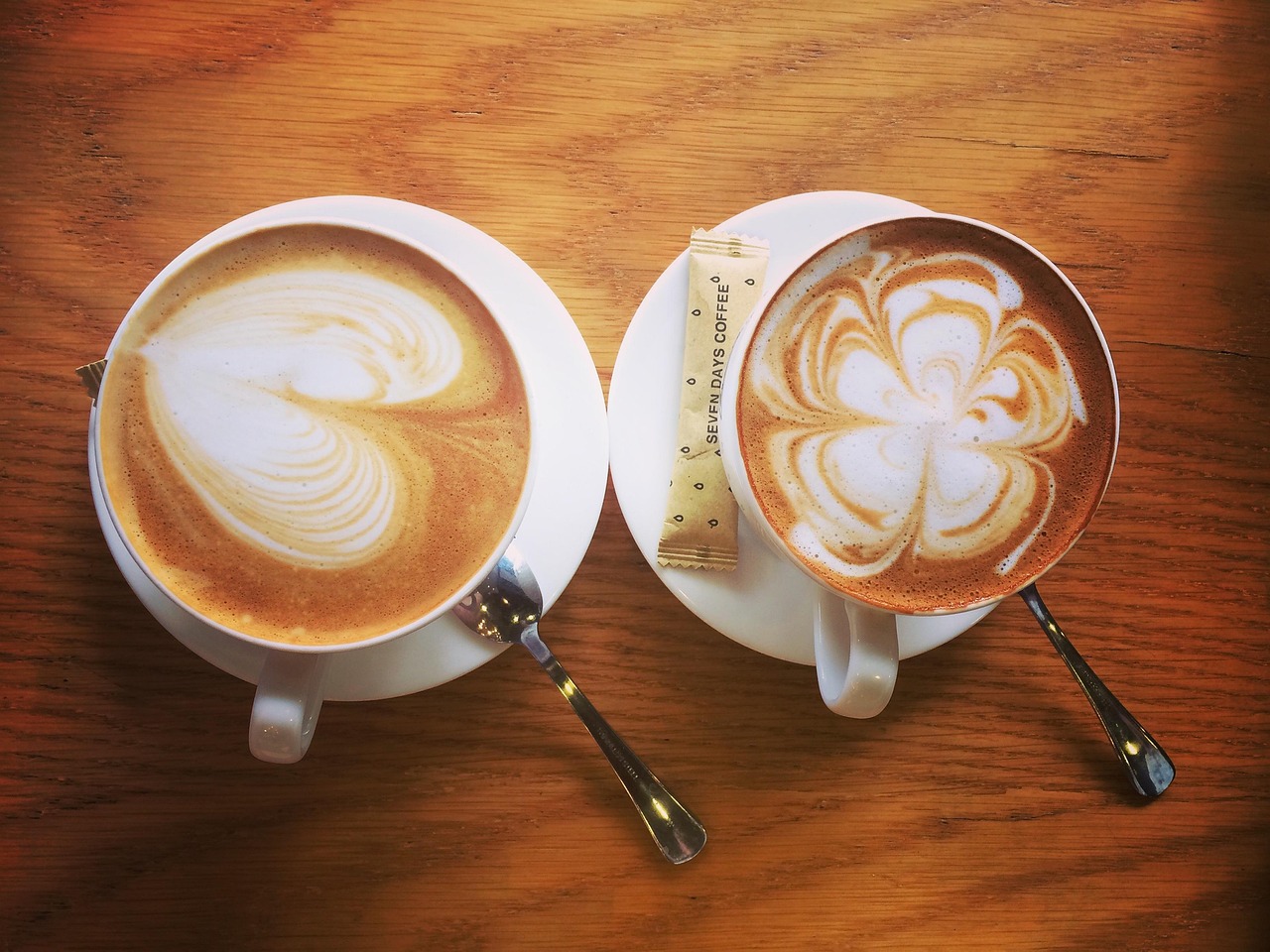 Macchiato espresso drinks with foam designs