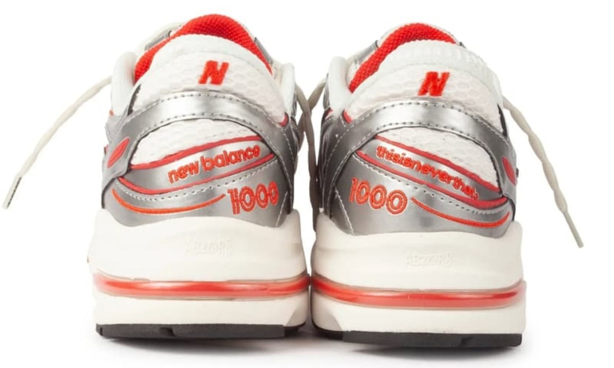 back heel of new balance silver and orange sneakers