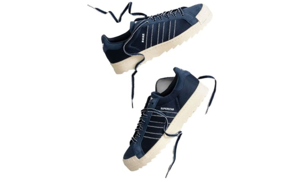 clot by adidas sneakers in midair