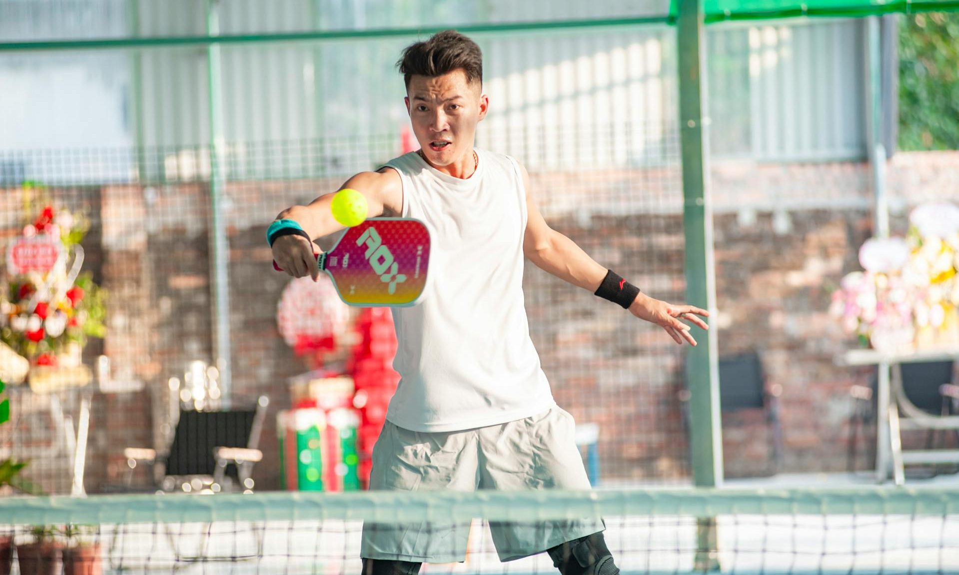 man playing pickleball