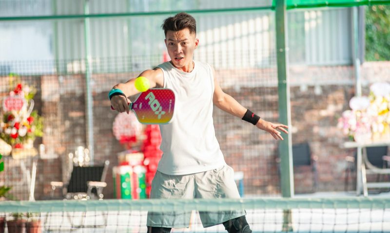 man playing pickleball