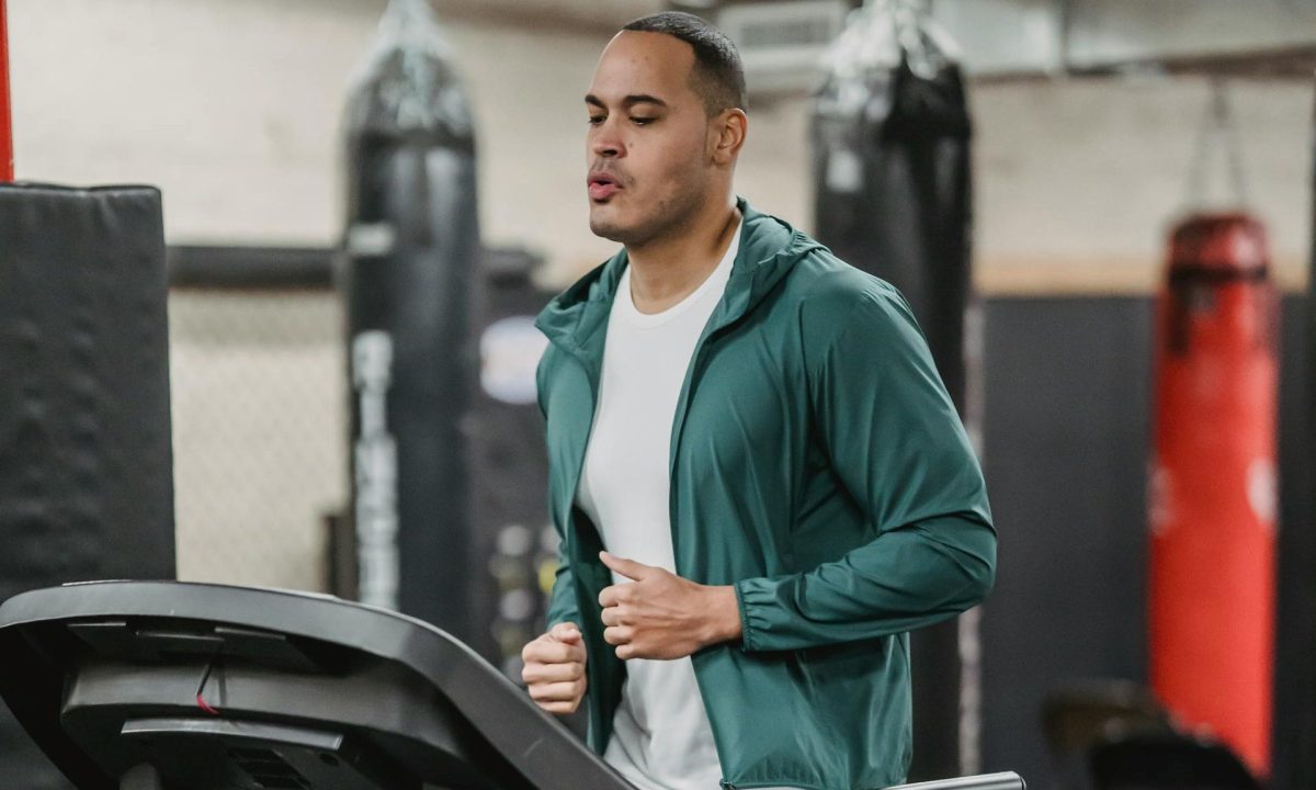 man running on treadmill