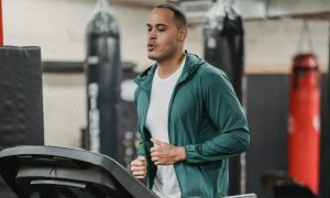 man running on treadmill