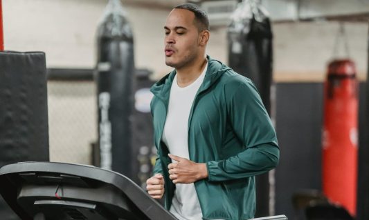 man running on treadmill