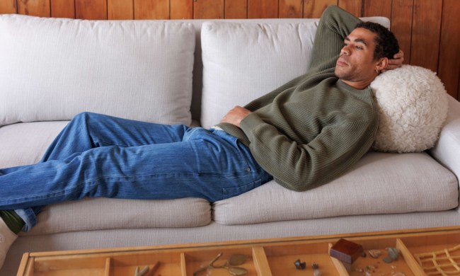 Alex Crane sweater on the couch