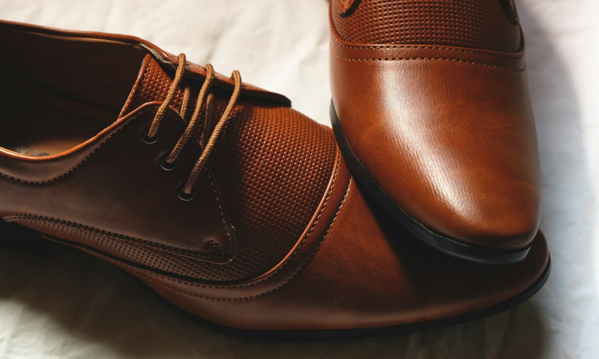 close up on brown leather shoes
