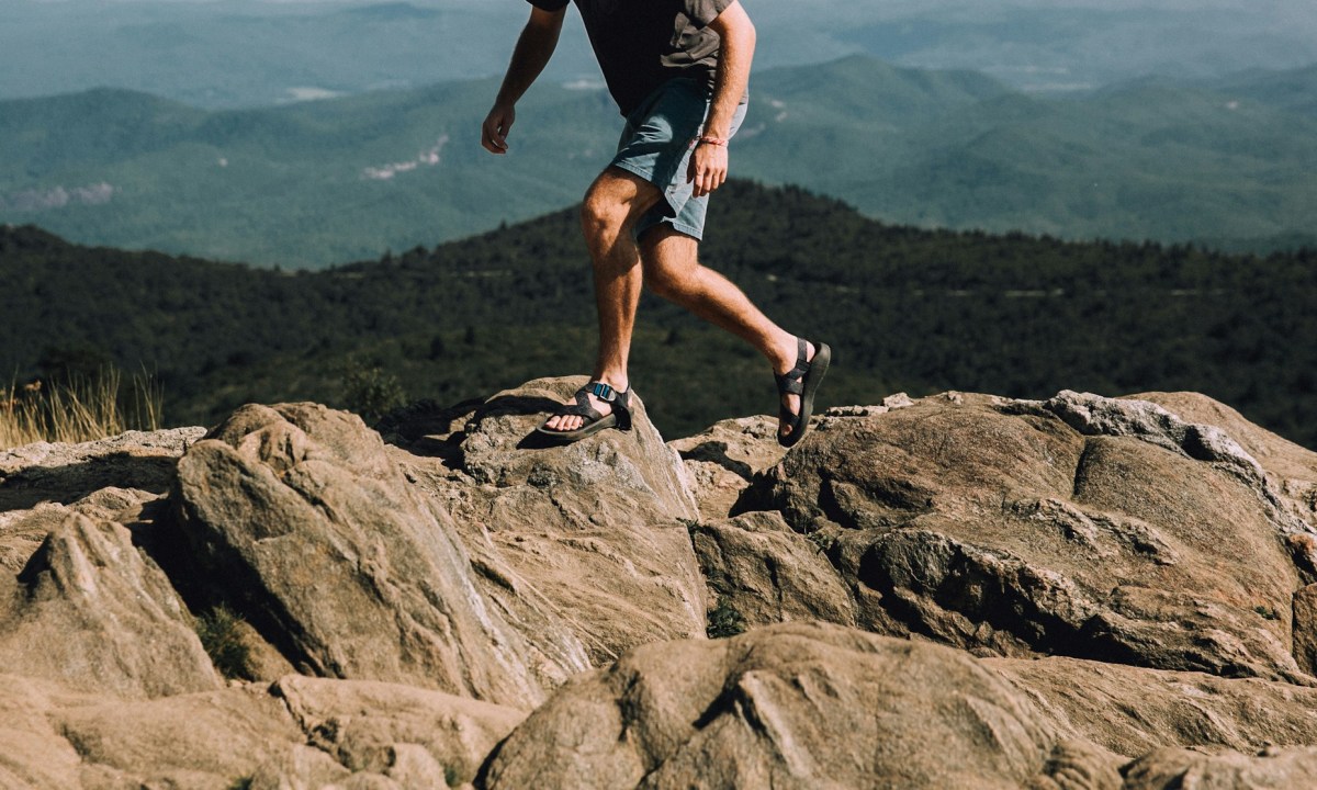 Man hiking in sandals