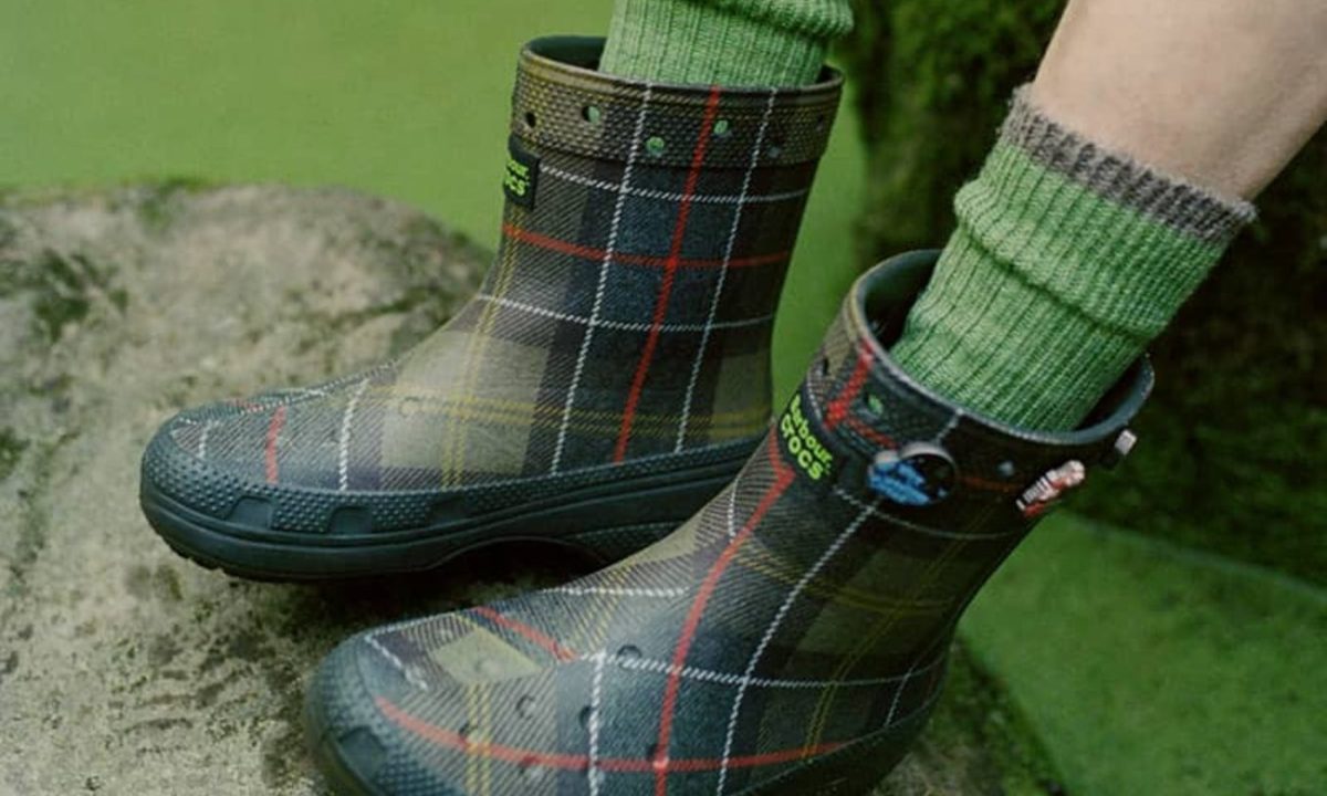 man wearing barbour crocs wellington boots