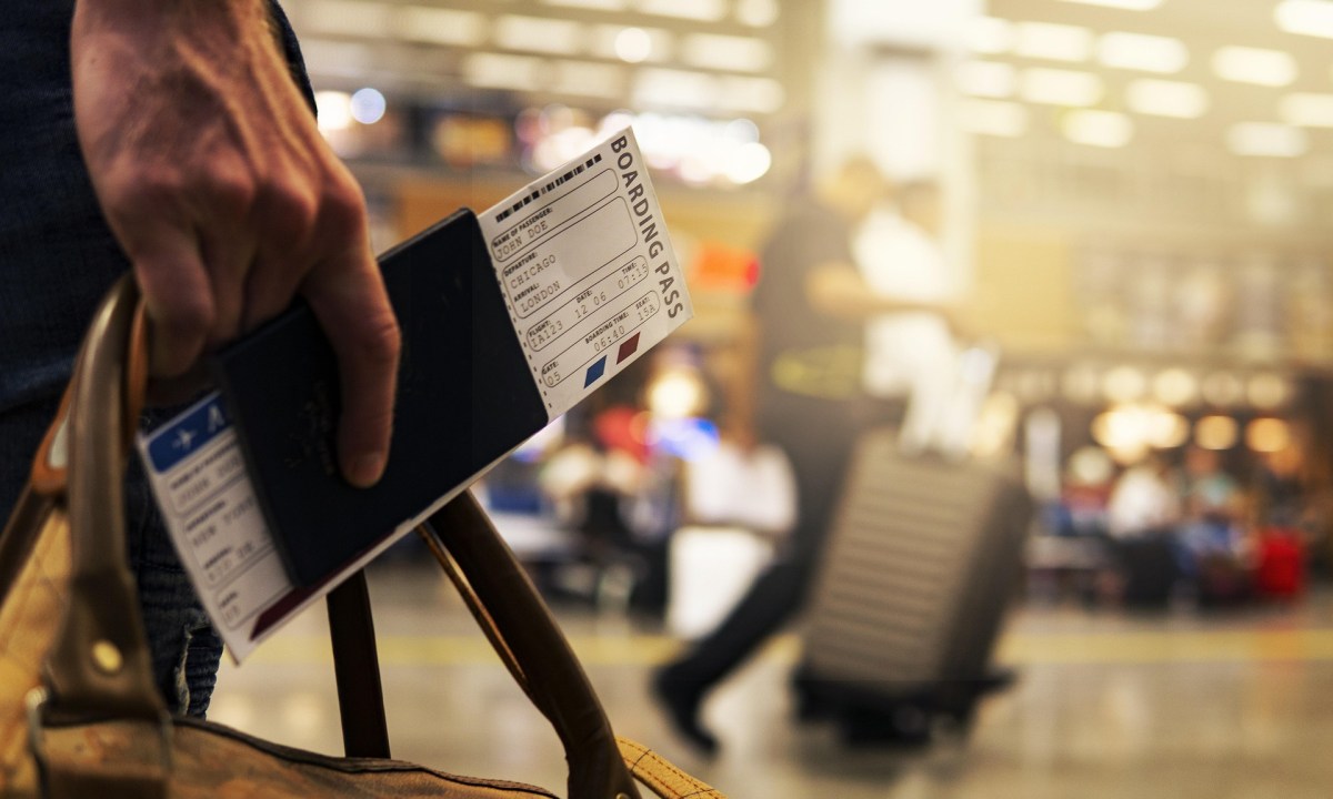Passport and plane ticket
