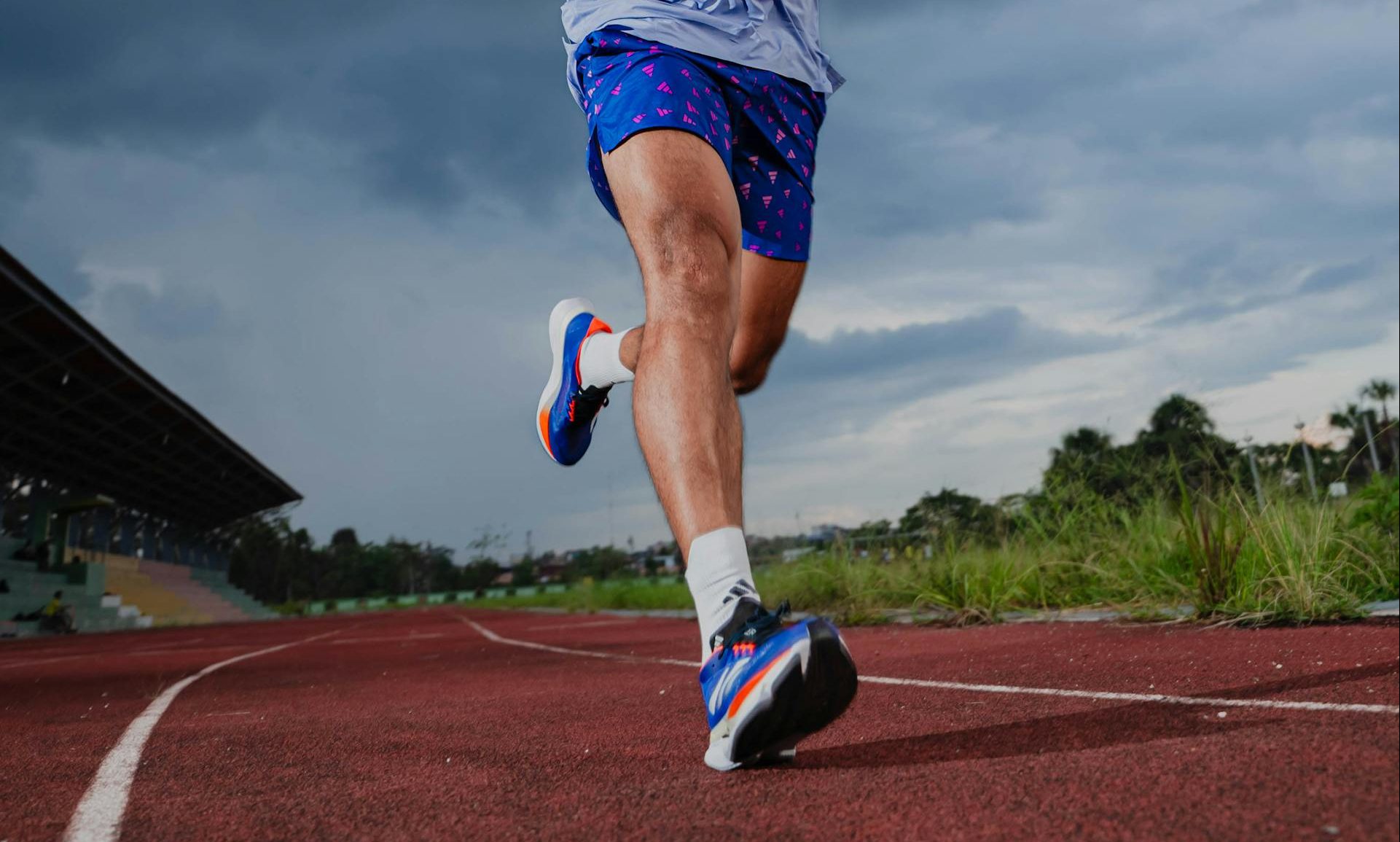 man running outdoors on track