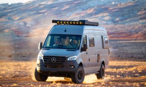 Rossmonster Skye campervan driving through the desert.