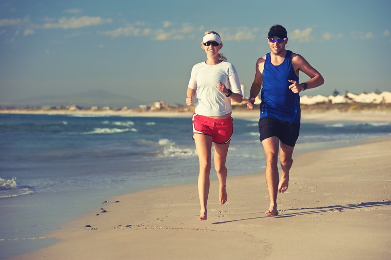Couple running on beach
