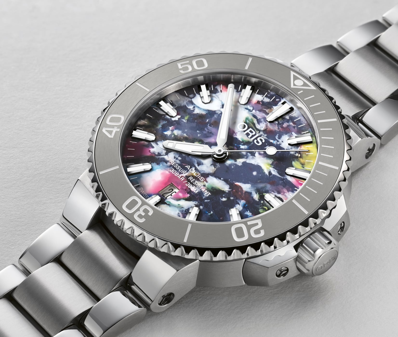 The colourful dial of the Aquis Date Upcycle 41.5 mm is made of recycled plastic bottles