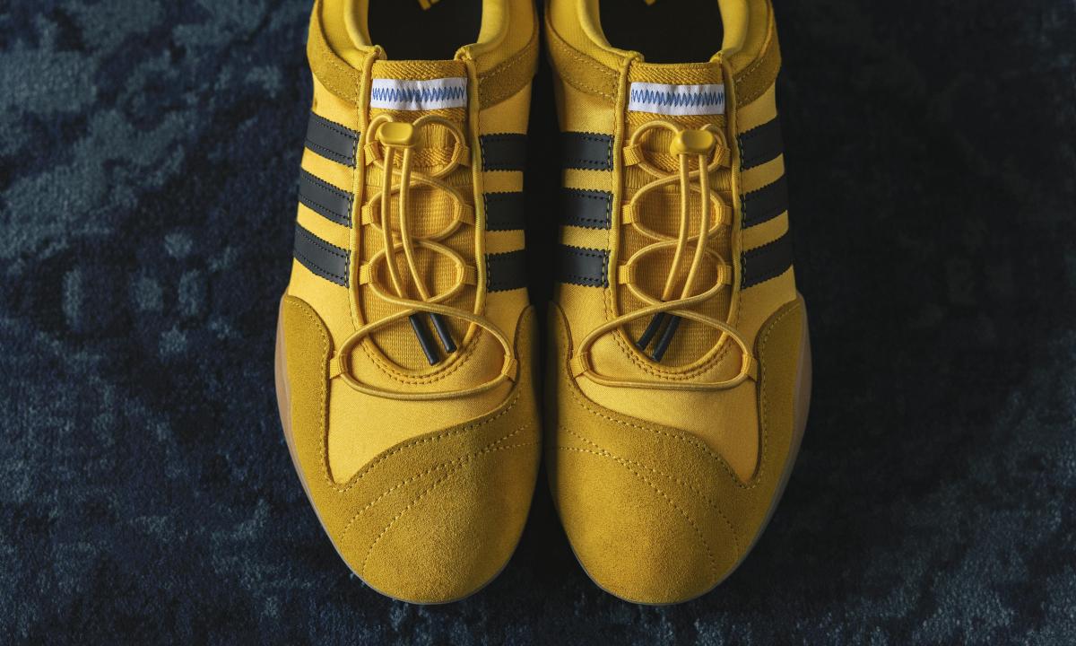 closeup on adidas bad bunny ballerina shoes in gold