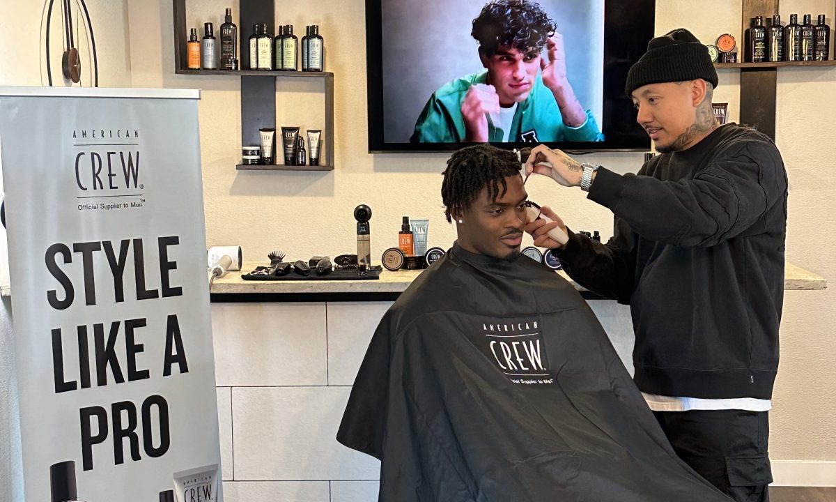 Malaki Starks with Vince the Barber