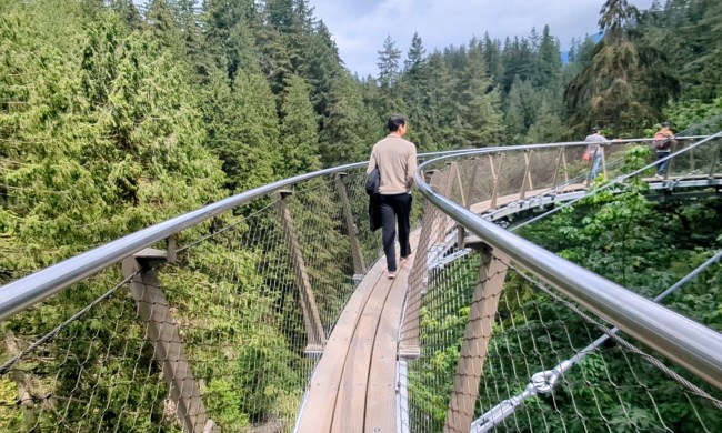 A man walking on the cliffwalk in vancouver