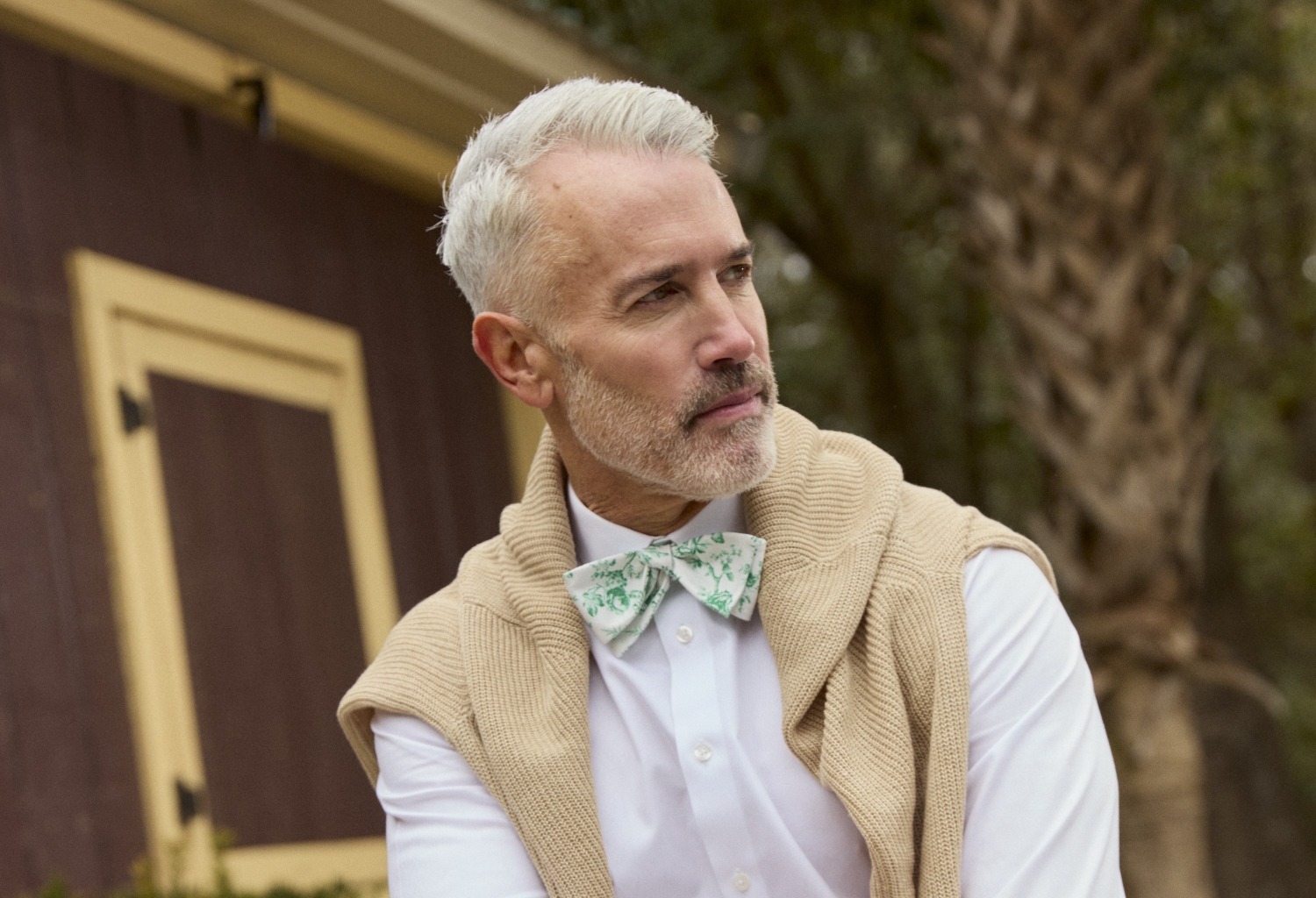 TieBar x Laura Ashley man in bow tie and sweater