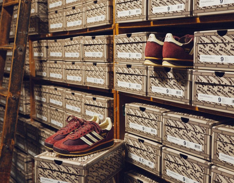 two adidas sneakers in a stockroom