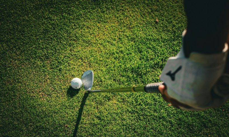 Man holding a golf club
