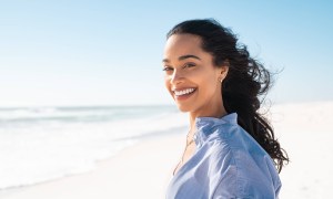 woman smiling on the beach
