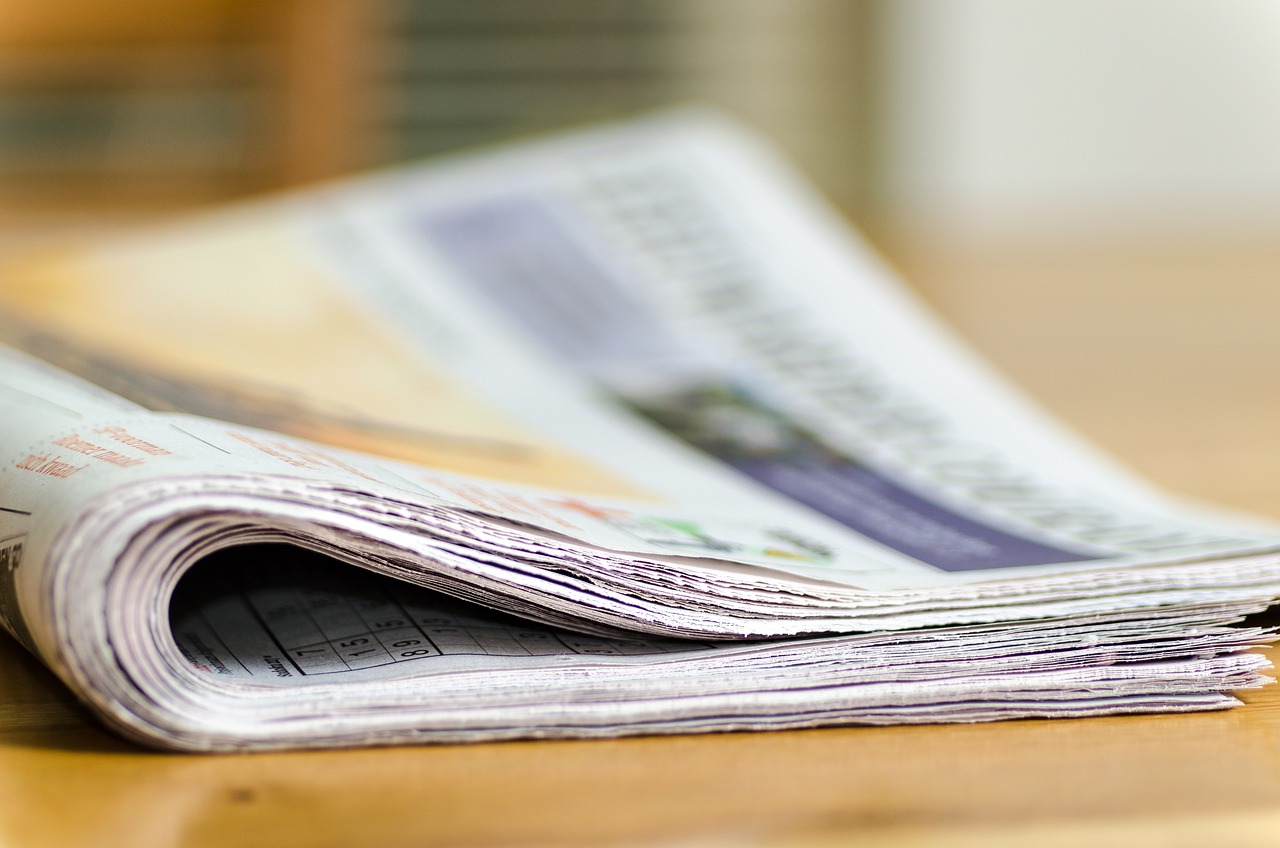 Newspapers folded over