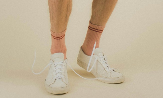 Man wearing white sneakers