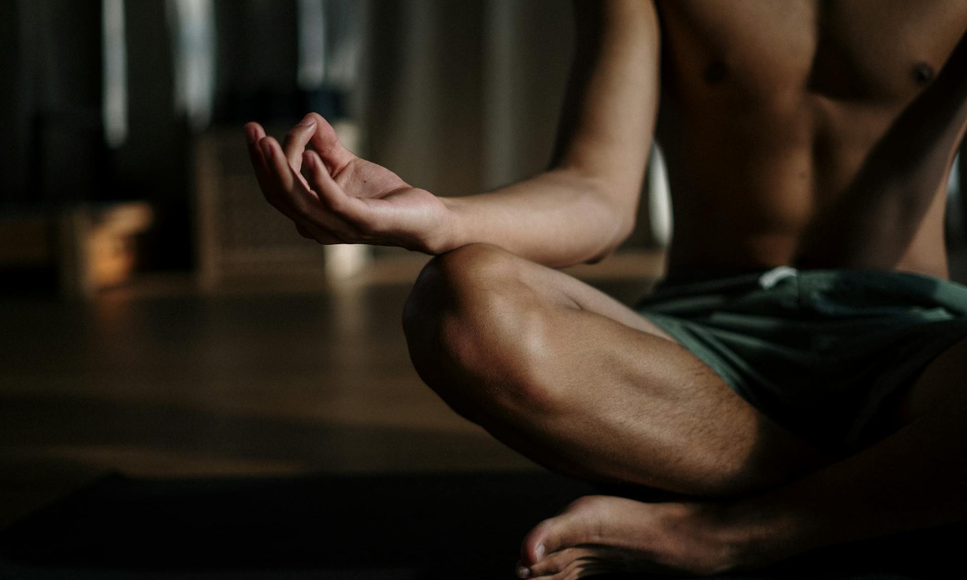 man sitting meditating meditation mindfulness