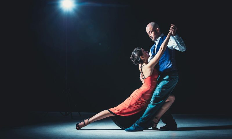 man and woman dancing together