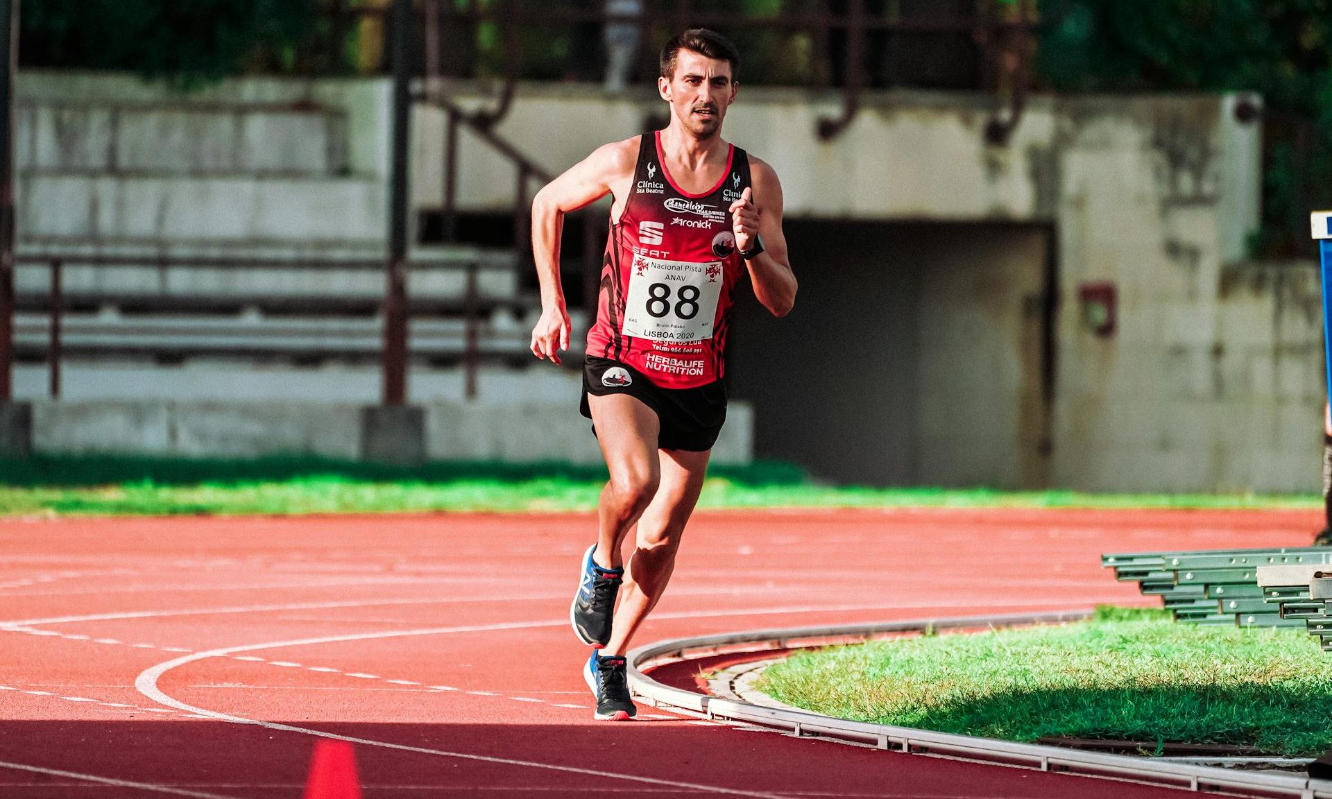 man running marathon outside on track
