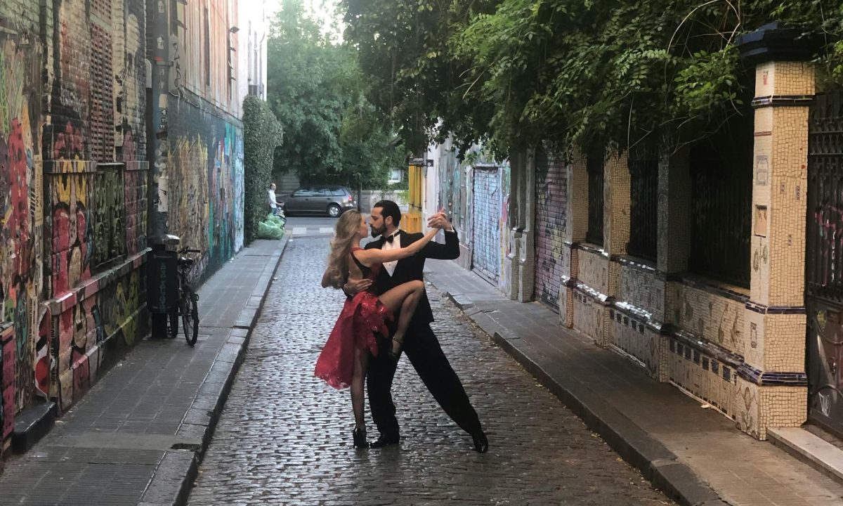 Couple dancing on city streets