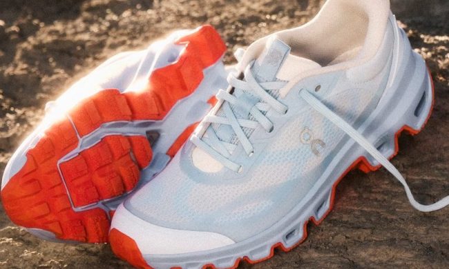 pair of loewe x on sneakers in dirt