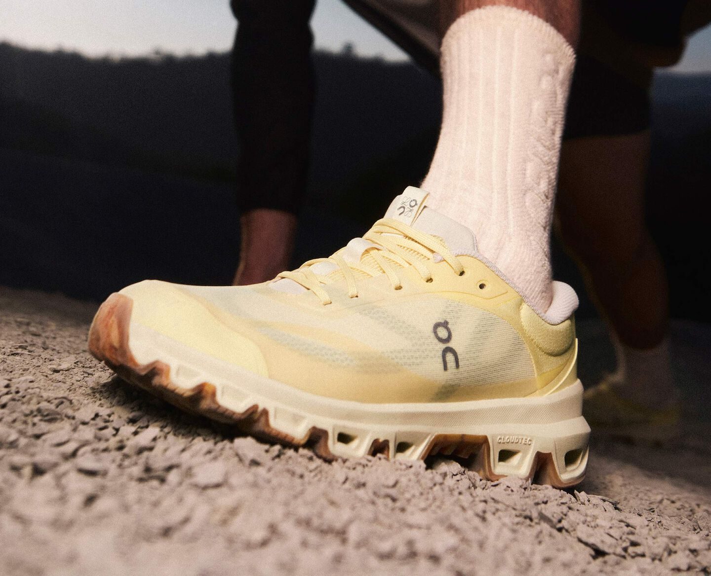 man wearing butter yellow loewe x on shoes