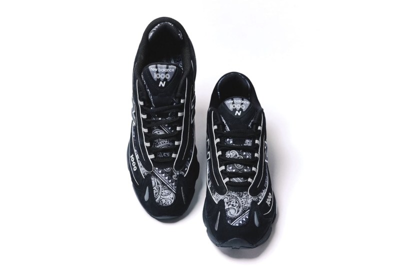 overhead shot of new balance x atmos sneakers