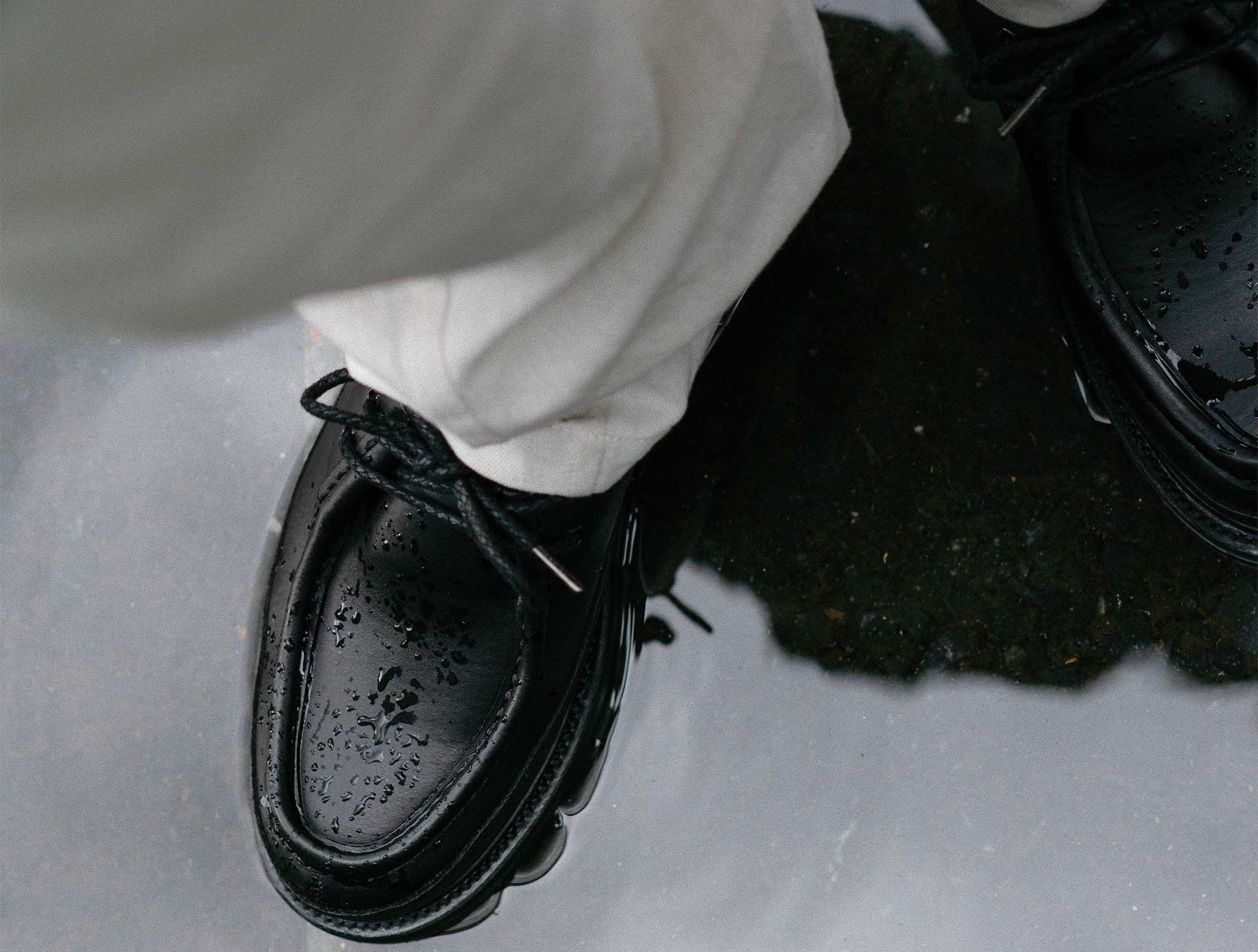 haven regal shoe & co. shoe in puddle
