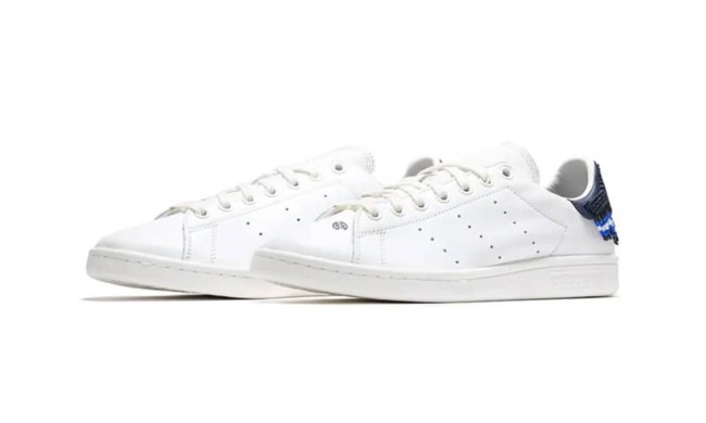 pair of white adidas stan smith sneaker