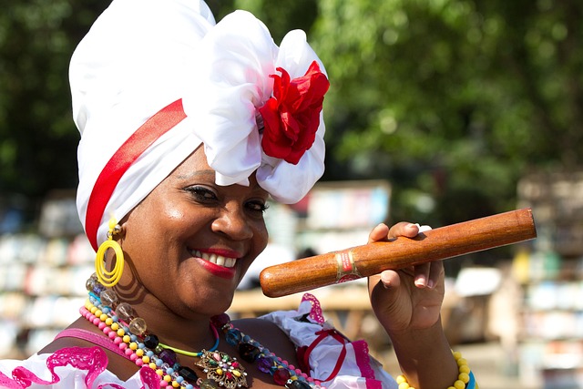 black woman smiling with a huge cigar