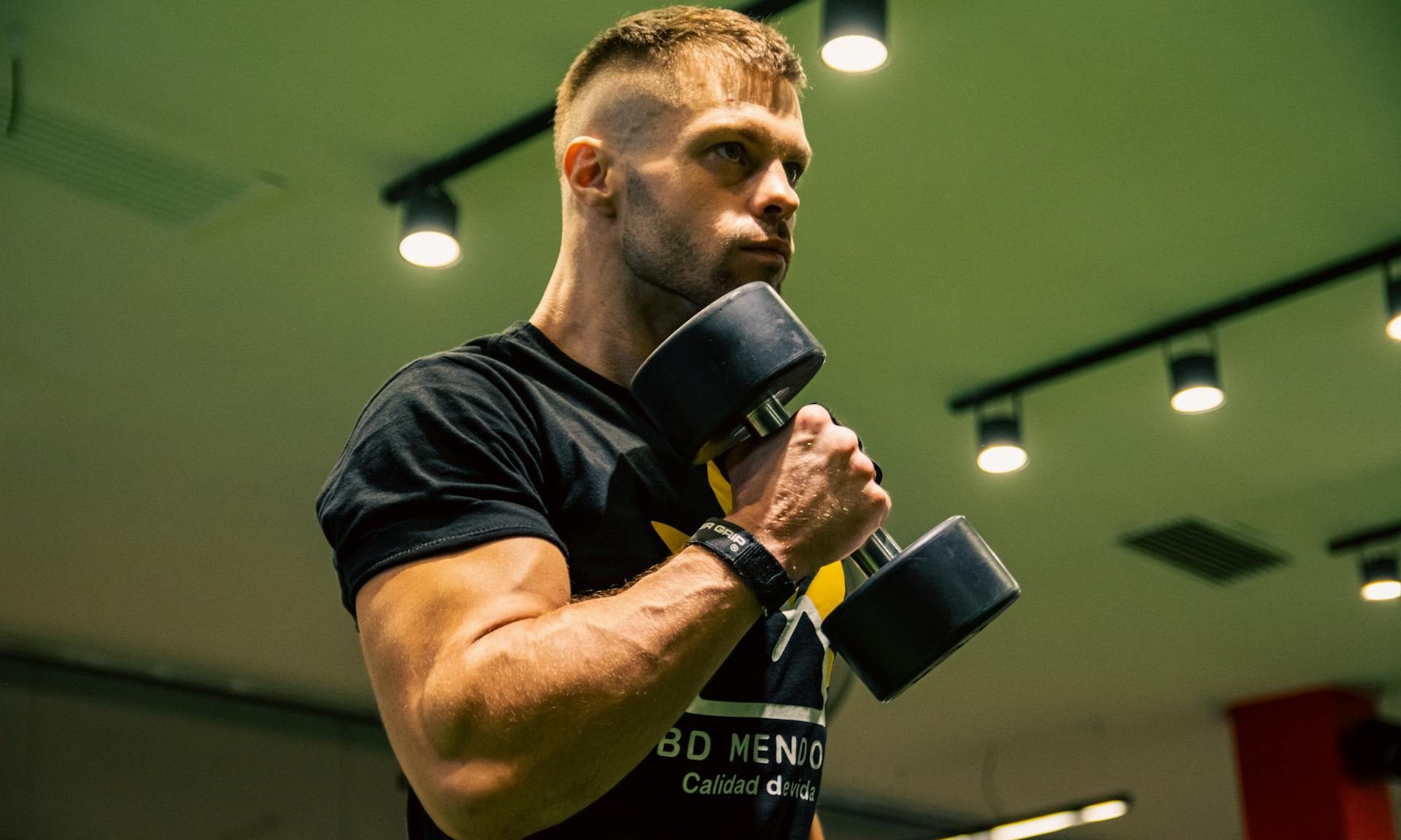 man lifting weights