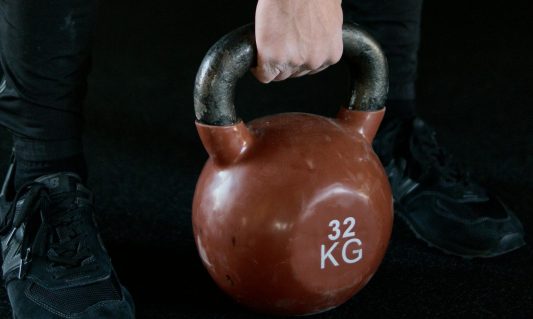 Picking up a kettlebell