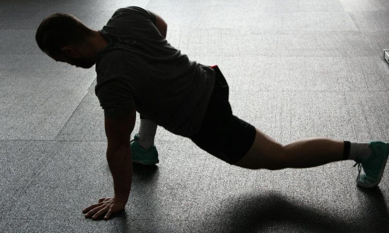man stretching legs