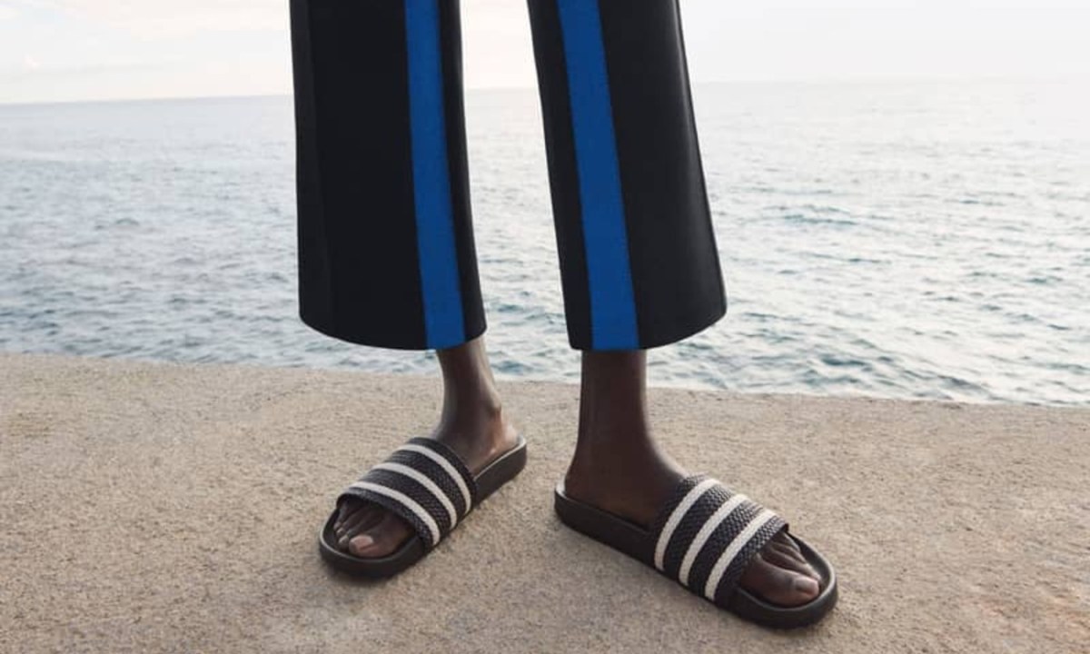man wearing adilette sandals from wales bonner x adidas