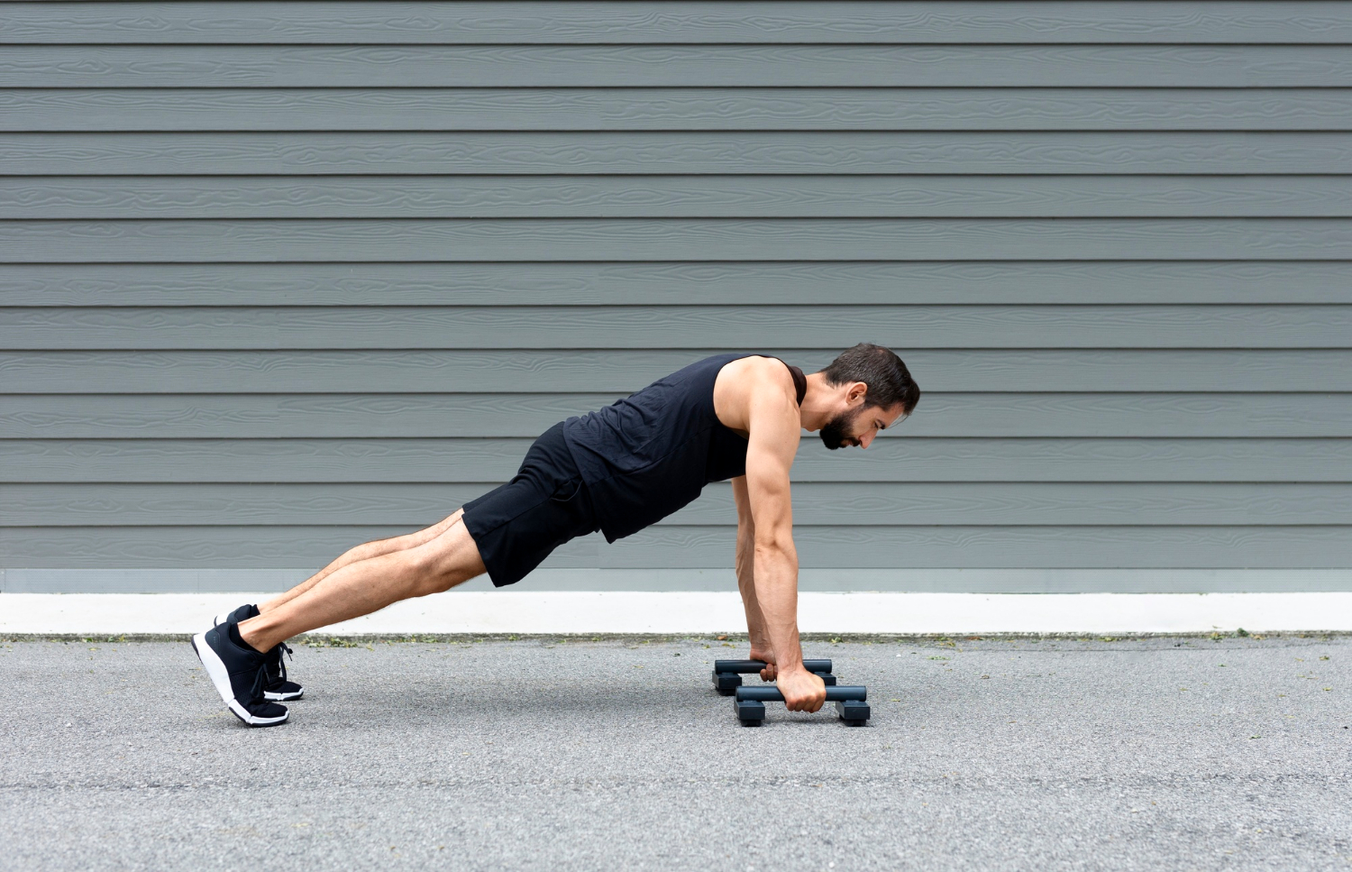 Dumbbell plank exercise.