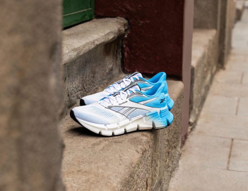 reebok sneakers on a step