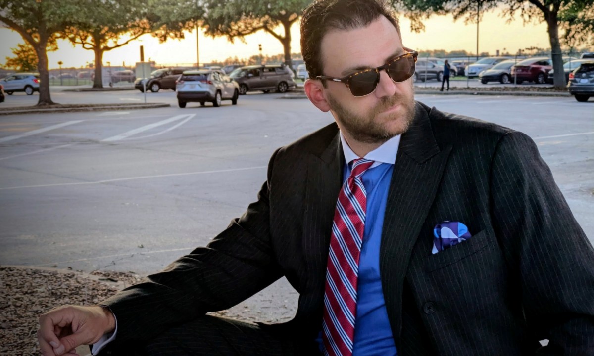 Man in power suit with sunglasses full