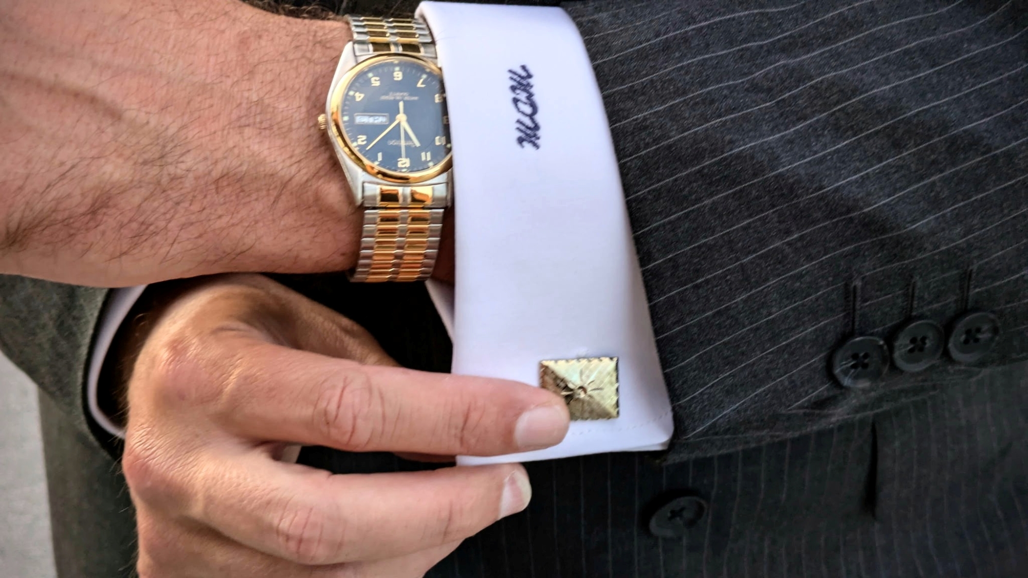 Man's watch and cufflinks