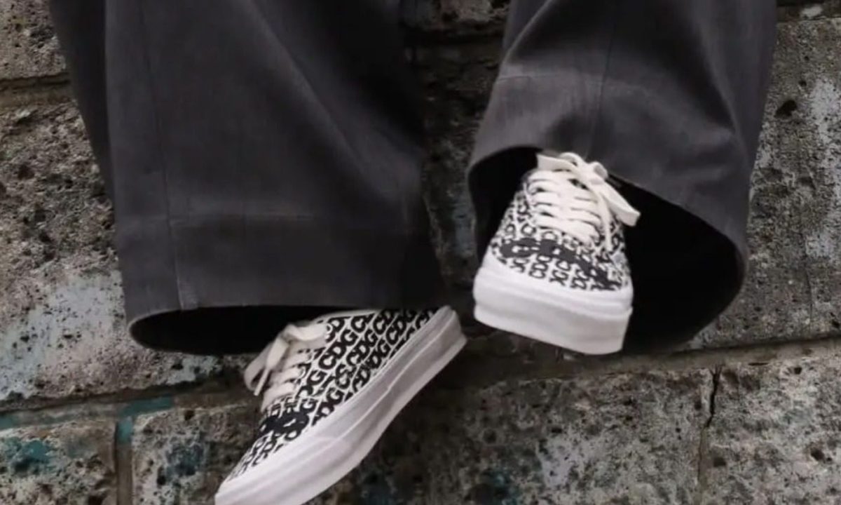 man wearing Comme des Garçons x Vans sneakers
