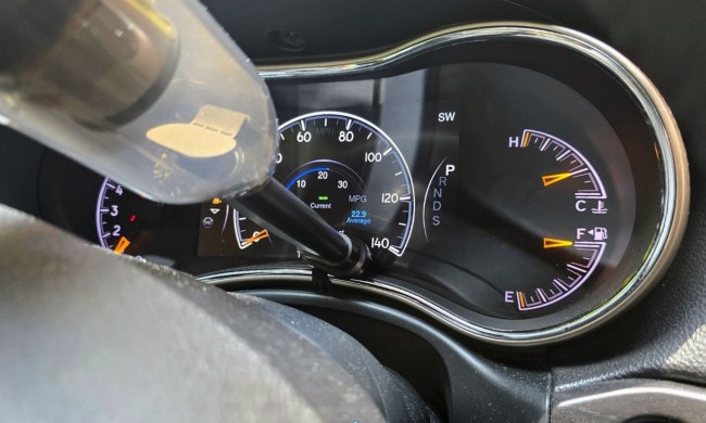 Vacuum cleaning a car dash