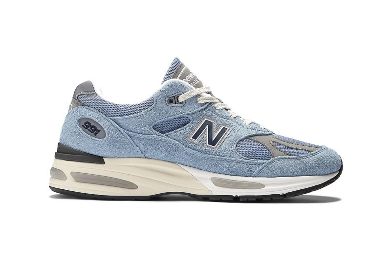 side view of new balance blue sneaker